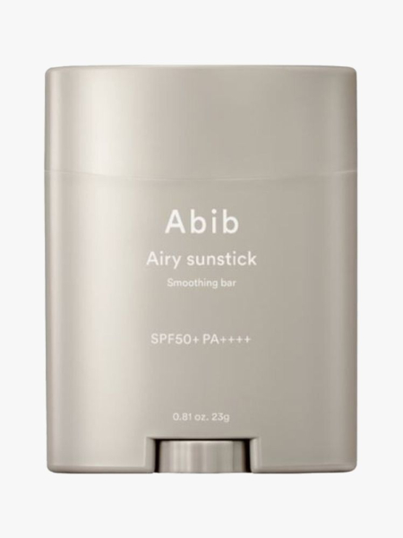 Abib Airy Sunstick Smoothing Bar SPF 50+ in branded component on a light gray background