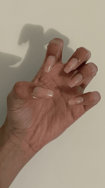 Taylor after applying the Kiss Bare But Better TruNude PressOn Nails